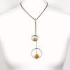collier forme Y pendentif anneaux métal boules cristal 0119514