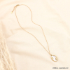 Collier pendentif bouton de nacre ovale corail acier inoxydable femme 0123151 doré