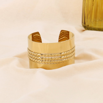 Large bracelet manchette acier style contemporain 0223523 doré