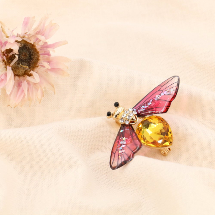 Broche épingle abeille strass acrylique métal 0523503 fushia