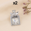 Pin's X2 flacon de parfum love métal strass 0623506 argenté