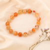 Bracelet élastique grosses perles en pierres véritables et acier 0223534 orange