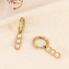 Boucles d'oreilles mini-créoles acier inoxydable 3 perles 0323585 doré
