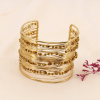 Bracelet manchette multi-brins ajustable en acier inoxydable et perles facettées en cristal 0223609 doré