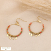 Boucles d'oreilles pendantes cercles acier inox pierre plume 0323055 rouge corail