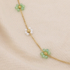 Collier acier inox fleur cristal perle acrylique 0125150 vert Collier acier inox fleur cristal perle acrylique 0125150 vert
