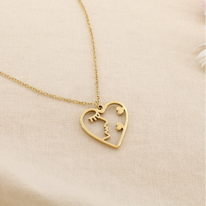 Collier en acier inoxydable cœur visage 0125133 doré