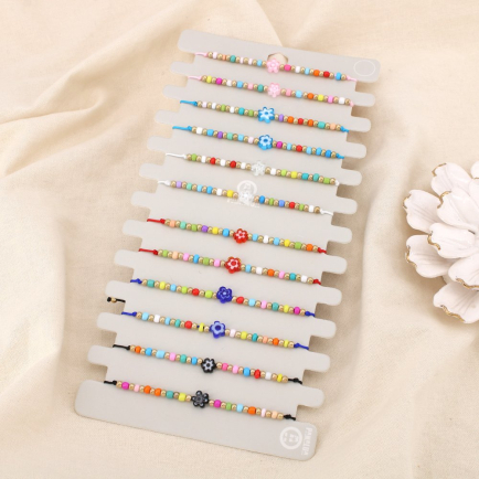 Lot de 12 bracelets fantaisie coulissants Perles rocaille multicolores 0225204 multi