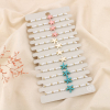 Lot de 12 bracelets fantaisie coulissants Étoile de mer et perles 0225206 multi