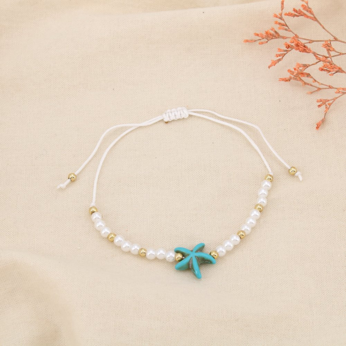 Lot de 12 bracelets fantaisie coulissants Étoile de mer et perles 0225206 multi