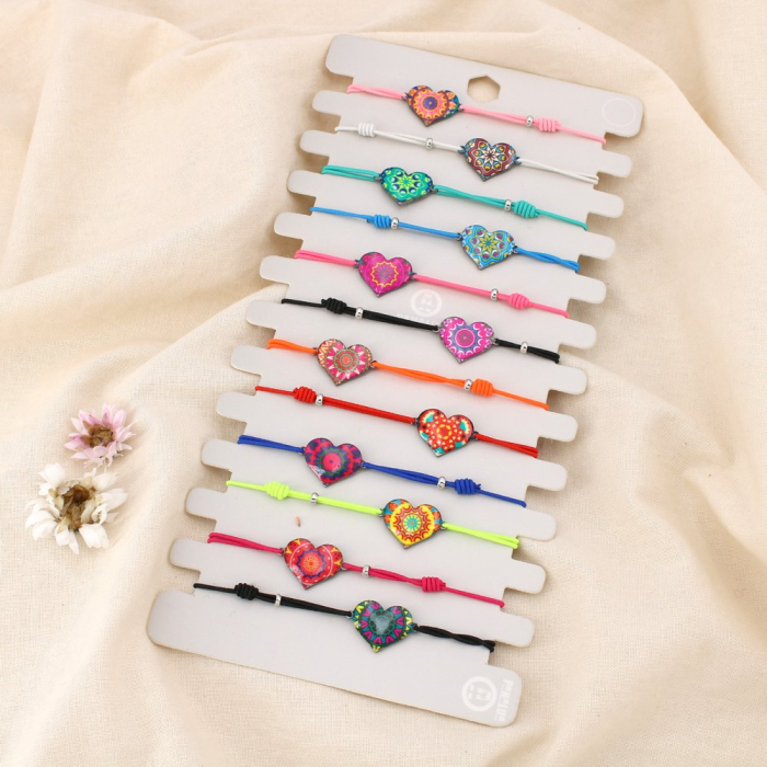 Lot de 12 bracelets élastiques fantaisie cœur émail 0225209 multi Lot de 12 bracelets élastiques fantaisie cœur émail 0225209 multi