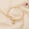 Bracelet jonc acier inoxydable breloque soleil rayonnant strass 0225231 doré