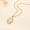 Collier acier inoxydable strass pendentif cœur sacré 0125580 doré Collier acier inoxydable strass pendentif cœur sacré 0125580 doré