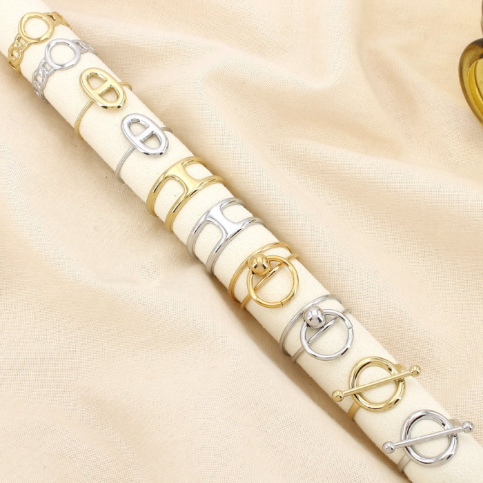 Ensemble 10 bagues réglable fines acier inox ajouré 0425545 doré/argenté