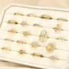 Ensemble 20 bagues acier ajustable doré strass 0425556 doré