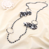 Collier sautoir léopard métal cristal polyester 0125573 noir