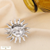 Broche soleil visage stylisé acier inoxydable 0524509 argenté