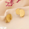 Boucles d’oreille clip acier inoxydable demi-ronds superposés 0324542 doré