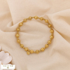 Bracelet élastique acier inoxydable perles sculptées bohème chic ethnique contemporain 0225045 doré
