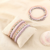 12 bracelets élastiques cristal facetté violet mauve perles nacrées 0226118 mauve