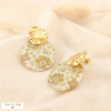 Boucles d’oreilles pendantes acier martelé résine translucide 0326135 naturel/beige