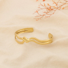 Bracelet Jonc Ouvert Lignes Ondulées Entrelacées Acier Inoxydable 0226077 doré